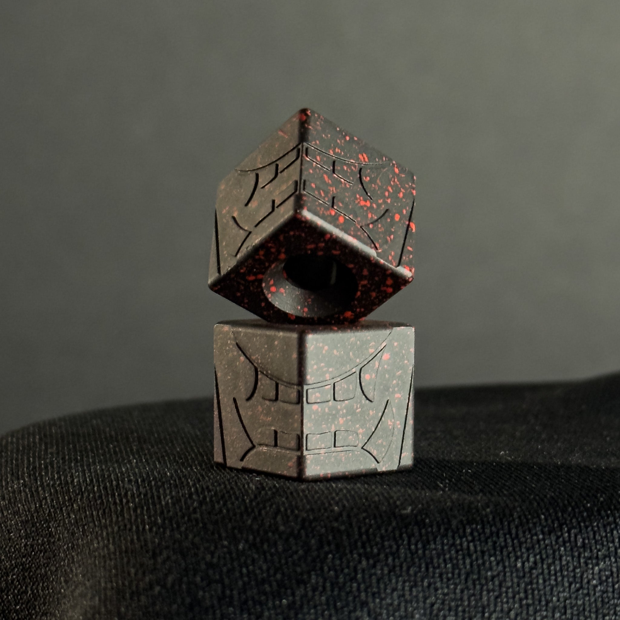 Cube Paracord Bead — Mengu Mempo Pattern in Armor Black/Red Splatter Cerakote