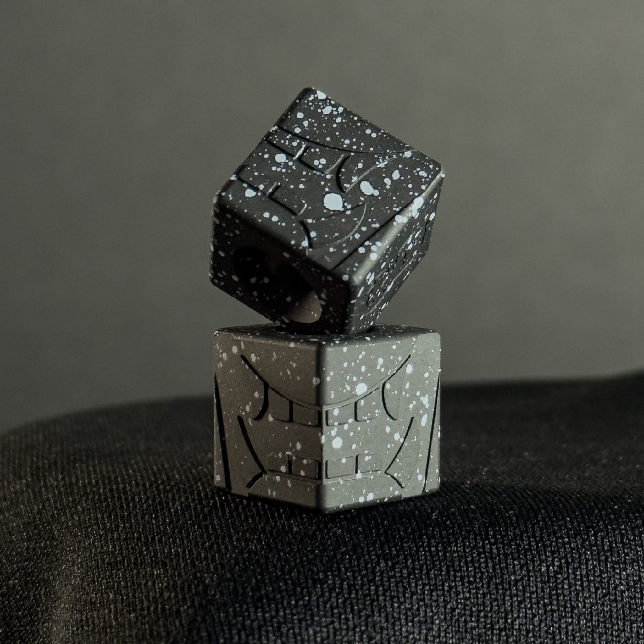 EDC Bead — Cube, Mengu Mempo Pattern in Armor Black/White Splatter Cerakote