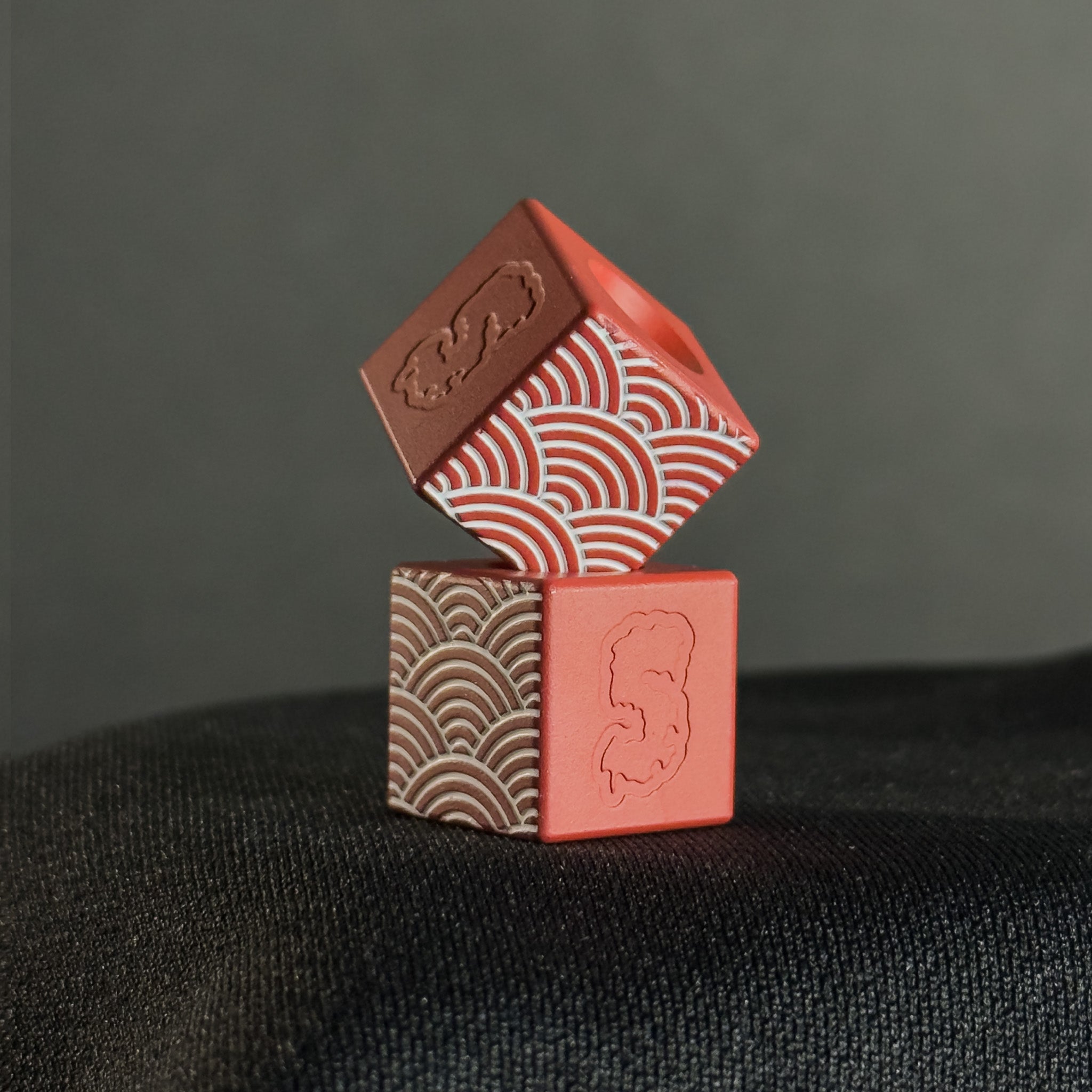 EDC Bead โ Cube, White Seigaiha Pattern in Firehouse Red Cerakote