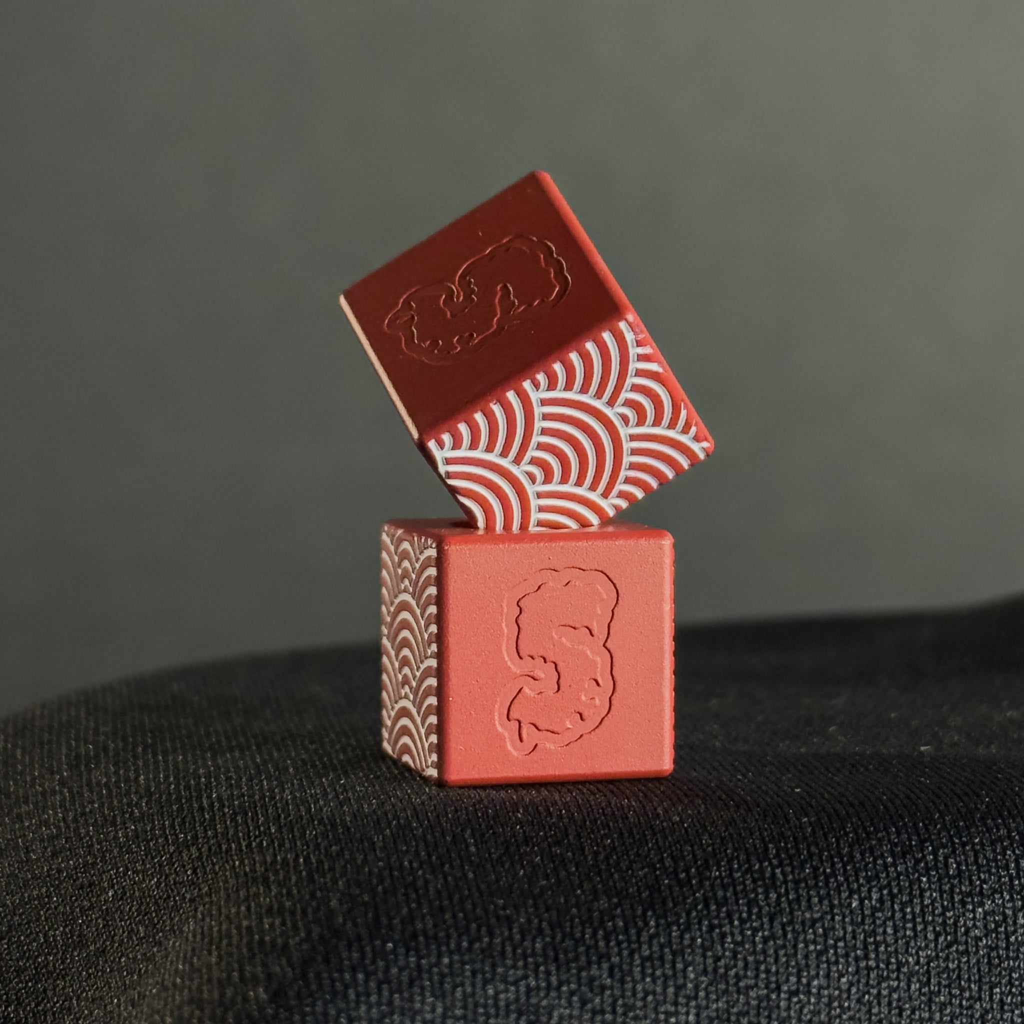 EDC Bead โ Cube, White Seigaiha Pattern in Firehouse Red Cerakote