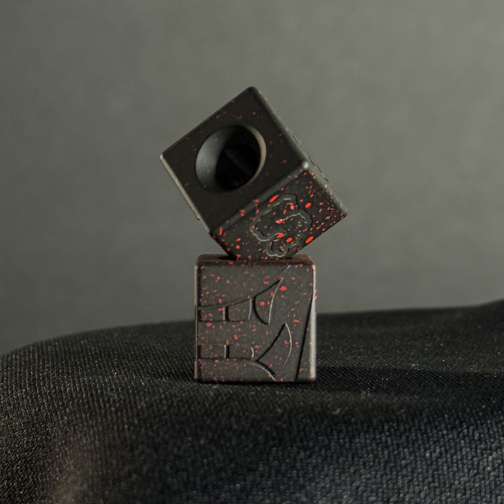 Cube Paracord Bead — Mengu Mempo Pattern in Armor Black/Red Splatter Cerakote