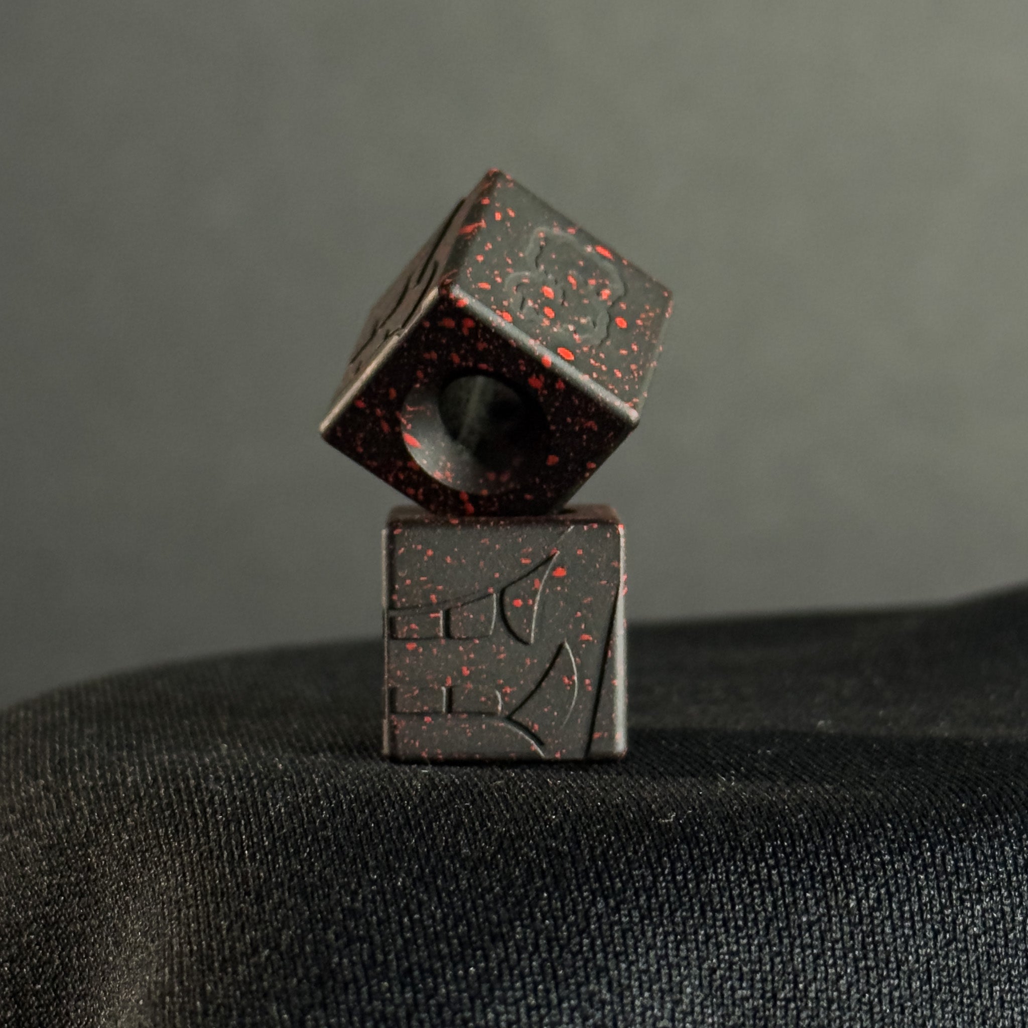 Cube Paracord Bead — Mengu Mempo Pattern in Armor Black/Red Splatter Cerakote