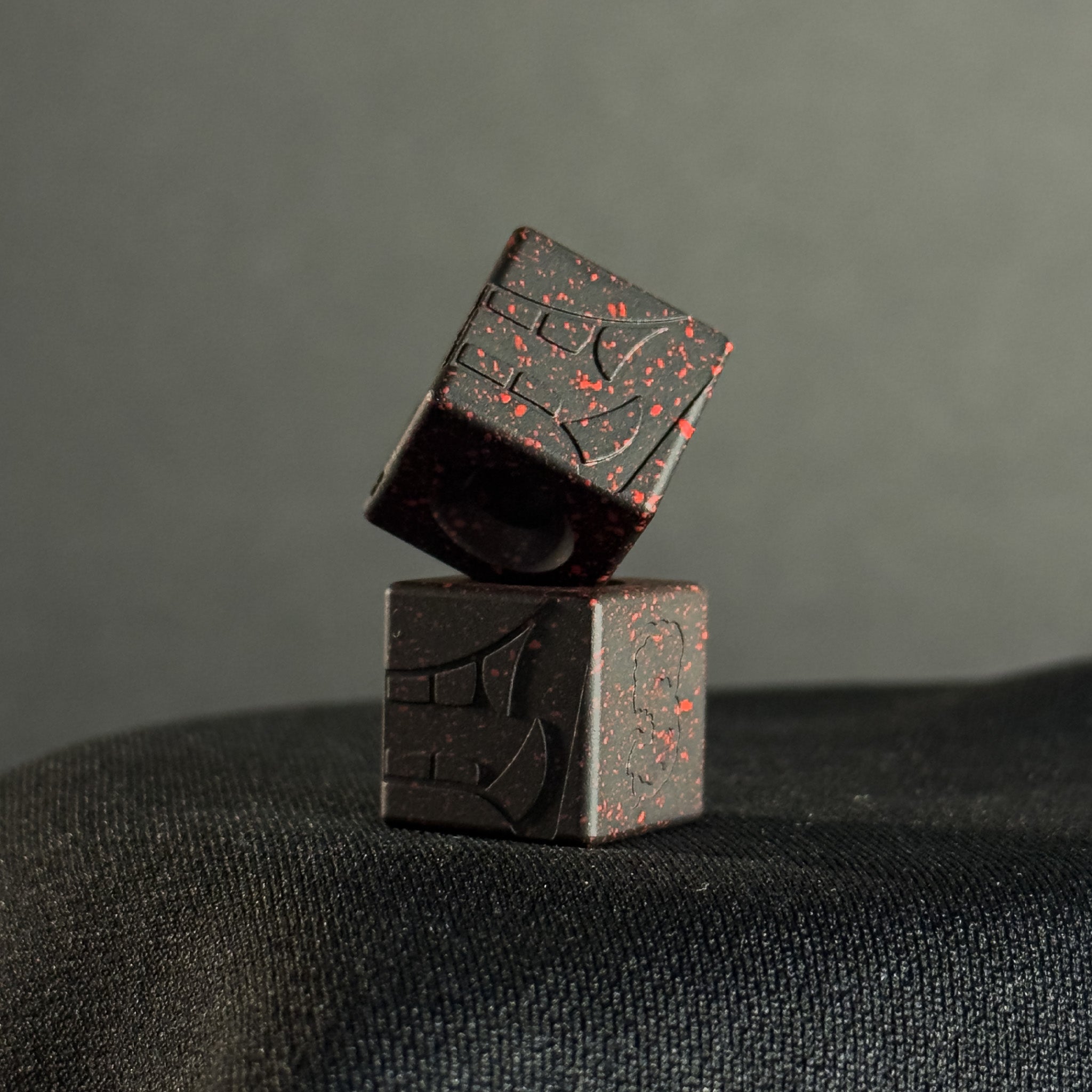 Cube Paracord Bead — Mengu Mempo Pattern in Armor Black/Red Splatter Cerakote