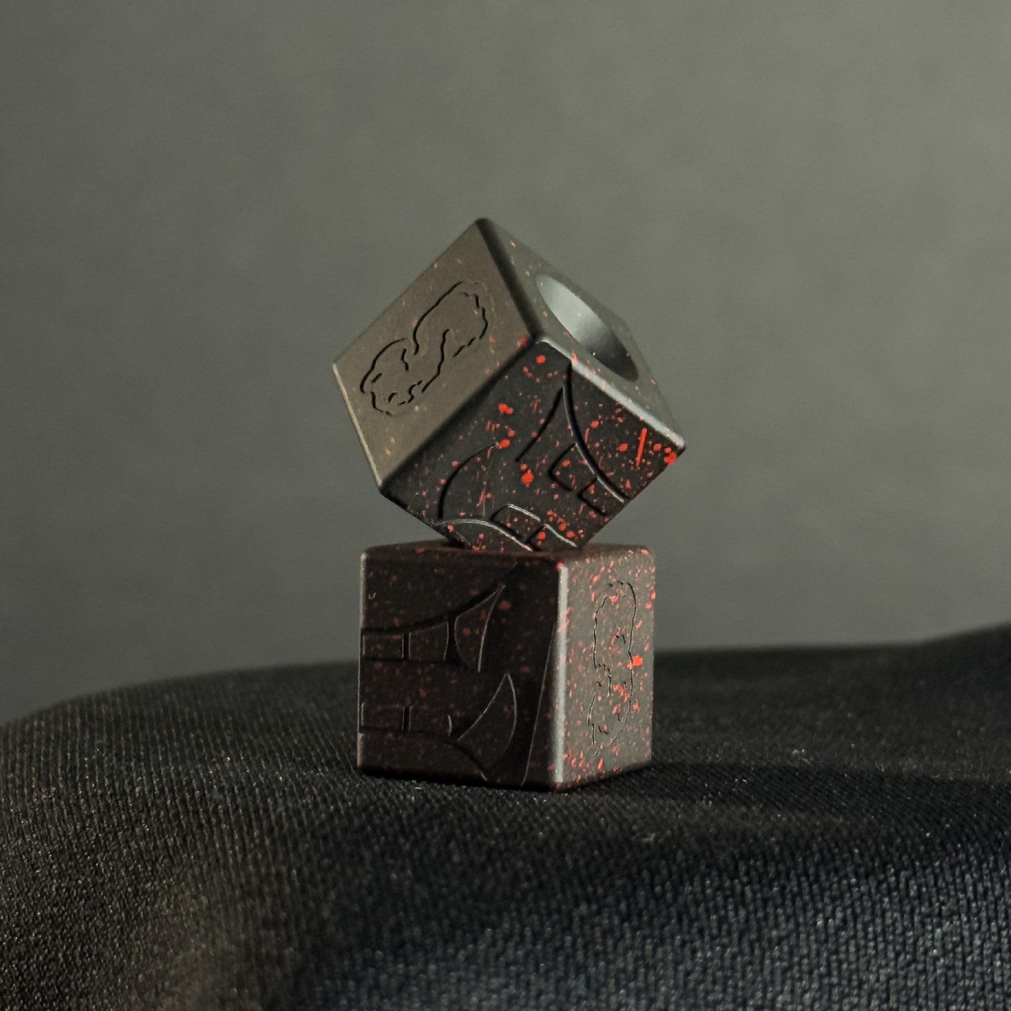 Cube Paracord Bead — Mengu Mempo Pattern in Armor Black/Red Splatter Cerakote